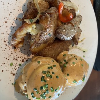 Rusty Pelican - Miami - Crab Cake Benedict, yummy and a little on the spicy side. - Seafood Near Me - Key Biscayne, Florida Rusty Pelican - Miami - Crab Cake Benedict, yummy and a little on the spicy side. - Seafood Near Me - Key Biscayne, Florida