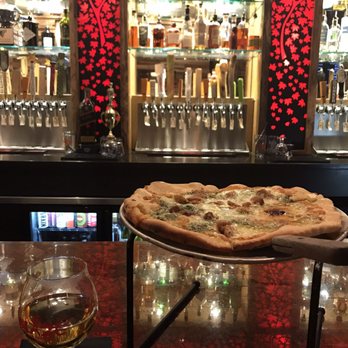 Blaze - Pesto and roasted garlic pizza! - Bars Near Me - Bangor, Maine