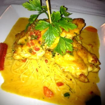 Spain Restaurant - Seafood stuffed chicken breast over angel hair - Spanish Near Me - Cranston, Rhode Island