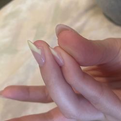 The White Spa Nails - Polish not extending all the way across the nail and rough nail pieces left behind (on all)