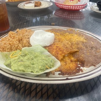 Moreno's - cheese enchiladas, served with rice, beans, sour cream and guac. - Mexican Near Me - Orange, California