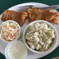 2 pc. fish with Cole slaw and potato salad.