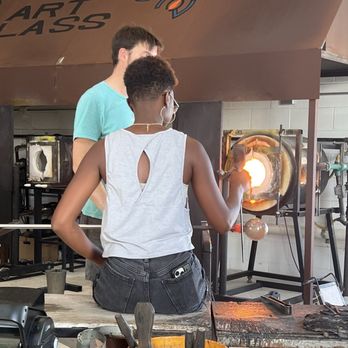 McFadden Art Glass - Leslie takes a turn. Keep it moving or a blob of molten glass is falling off your pole. - Party & Event Planning Near Me - Baltimore, Maryland