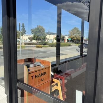 Tint 'Em Up - Commercial glass door restored after removing acid-etched graffiti damage. - Home Window Tinting Near Me - Los Angeles, California Tint 'Em Up - Commercial glass door restored after removing acid-etched graffiti damage. - Home Window Tinting Near Me - Los Angeles, California