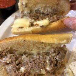 Dominic's Pizza - A cheese sandwich with a little bit of steak.