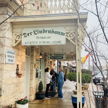 Der Lindenbaum - people standing outside of a restaurant - German Near Me - Fredericksburg, Texas