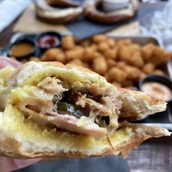 Global Brew Tap House - Tasty little Havana sandwich. Tots are good. pretzel in the background was hard and crusty, I wouldn't suggest it.