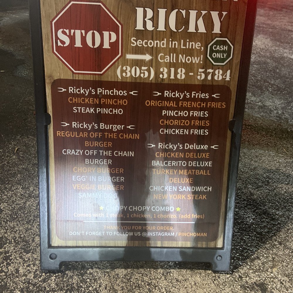 Pinchoman - a sign for a restaurant - Burgers Near Me - Hialeah, Florida