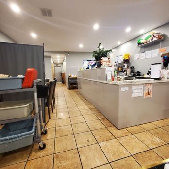 Happy Salad - the kitchen and dining area of a restaurant - Bubble Tea Near Me - Brooklyn, New York