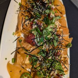 Poke nachos, good but not worth an hour wait. Poke nachos, good but not worth an hour wait.