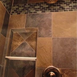 Peckenpaugh Plumbing - Custom tile shower! Huge walk-in with a seat
