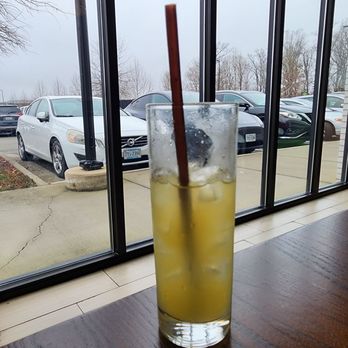 The Daily Kitchen & Bar - Passion fruit Mimosa - New American Near Me - Henrico, Virginia