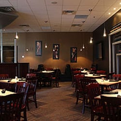 Scotty's - Part of the dinning room resembles our original location with an added wine display.