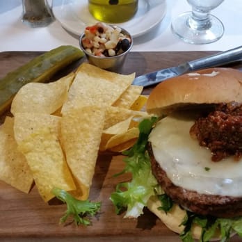 Field & Vine - The Knapp burger with tortilla chips, marinated onions, and a delicious side of Cayuga caviar (corn relish) - New American Near Me - Romulus, New York