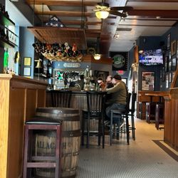 The Pour Farm Tavern - View of bar and only the tables from the window seats