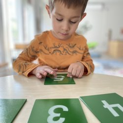 Power of Two Montessori - Working with the sandpaper numbers Montessori material.