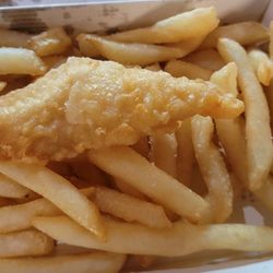 Costi's Fish and Chips - This tiny, greasy, limp, horrible "thing" is what passes for a fish "fillet" at Costi's.