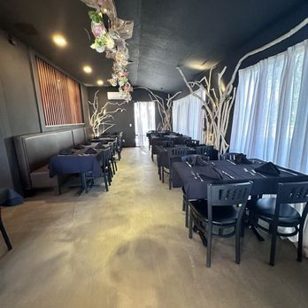 Flames Mediterranean Bar and Grille - Seating at restaurant - Mediterranean Near Me - Vero Beach, Florida Flames Mediterranean Bar and Grille - Seating at restaurant - Mediterranean Near Me - Vero Beach, Florida