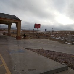 Calhan Inn - Business sign and parking lot area