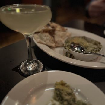 Milestone - Mystic - two plates of food and a glass of wine - Bars Near Me - Mystic, Connecticut Milestone - Mystic - two plates of food and a glass of wine - Bars Near Me - Mystic, Connecticut