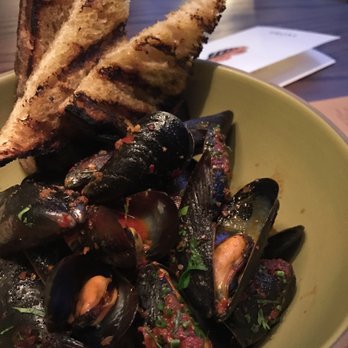 Proxi - Mussels in the most delicious red sauce. We asked for more bread!! - Tapas/Small Plates Near Me - Chicago, Illinois Proxi - Mussels in the most delicious red sauce. We asked for more bread!! - Tapas/Small Plates Near Me - Chicago, Illinois