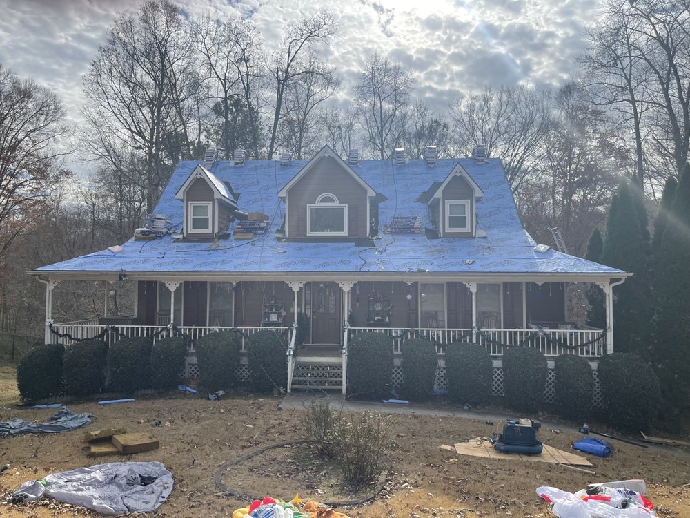 Slide of Robin Hood Roofing