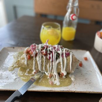 First Watch - Pork Carnitas Burrito with a Morning Glory juice drink. - Breakfast & Brunch Near Me - Prosper, Texas