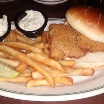 Miller's Pub - The Battered Alaskan Cod Sandwich with homemade tarter sauce, coleslaw, fries and a pickle. So good! - American Near Me - Chicago, Illinois