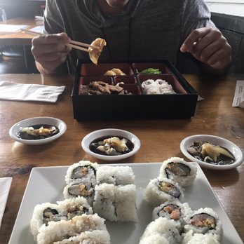 Ginza Town - Three deluxe sushi rolls. Bento box with beef teriyaki, gyoza, seaweed salad, and spicy tuna roll - Japanese Near Me - Portland, Maine Ginza Town - Three deluxe sushi rolls. Bento box with beef teriyaki, gyoza, seaweed salad, and spicy tuna roll - Japanese Near Me - Portland, Maine