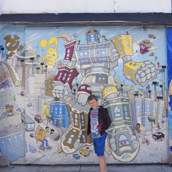 Sirron Norris Studio & Gallery - Our son at Sirron's fabulous mural on Balmy Alley off 24th Street, Mission District. - Art Classes Near Me - San Francisco, California Sirron Norris Studio & Gallery - Our son at Sirron's fabulous mural on Balmy Alley off 24th Street, Mission District. - Art Classes Near Me - San Francisco, California