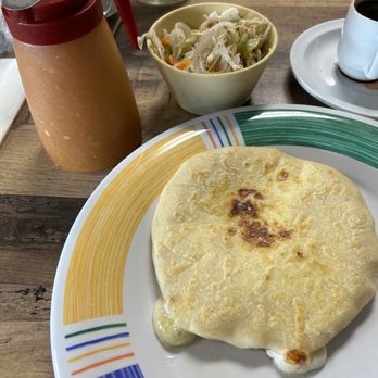 El Atlakat Restaurants - Cheese pupusa with pickled veggie/slaw salad and mild pepper sauce - Salvadoran Near Me - Pembroke Pines, Florida El Atlakat Restaurants - Cheese pupusa with pickled veggie/slaw salad and mild pepper sauce - Salvadoran Near Me - Pembroke Pines, Florida