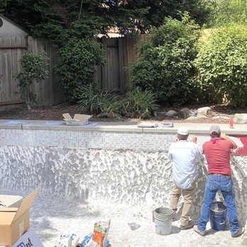 Chambers Pool Service & Plaster - Putting the new tile in - Pool Cleaners Near Me - Vacaville, California
