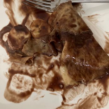 Paris Bakeshop & Cafe - Crêpe... I only took 2 bites and this is how much was left - Bakeries Near Me - Orlando, Florida Paris Bakeshop & Cafe - Crêpe... I only took 2 bites and this is how much was left - Bakeries Near Me - Orlando, Florida