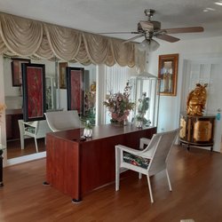 Gray Mrs Fortune Teller & Card Reader - Mrs Gray is a psychic reader, not a restaurant. She is very good. Same location since 1977.