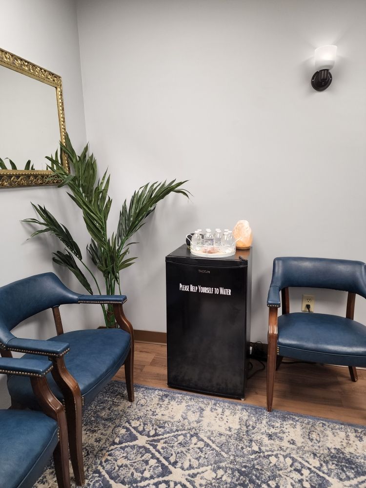 Knead It Massage & Esthetics Logo