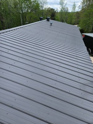 Metal Roof Installation - We also offer metal roofing for clients looking for more of a modern curb appeal. Call or text (270) 635-1598 for a free quote.