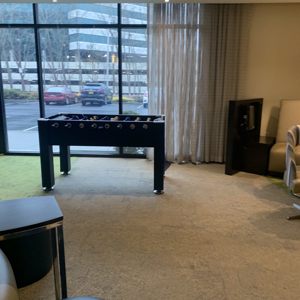 EVEN Hotel Norwalk - Lounge area with foosball table - Hotels Near Me - Norwalk, Connecticut