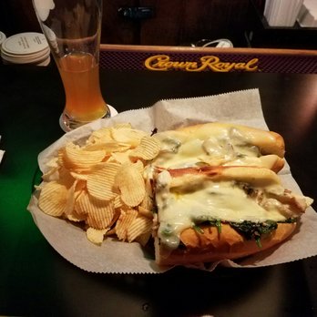 Locust Rendezvous - Roast pork with sauteed spinach and fresh garlic on fresh baked bread. - Dive Bars Near Me - Philadelphia, Pennsylvania Locust Rendezvous - Roast pork with sauteed spinach and fresh garlic on fresh baked bread. - Dive Bars Near Me - Philadelphia, Pennsylvania