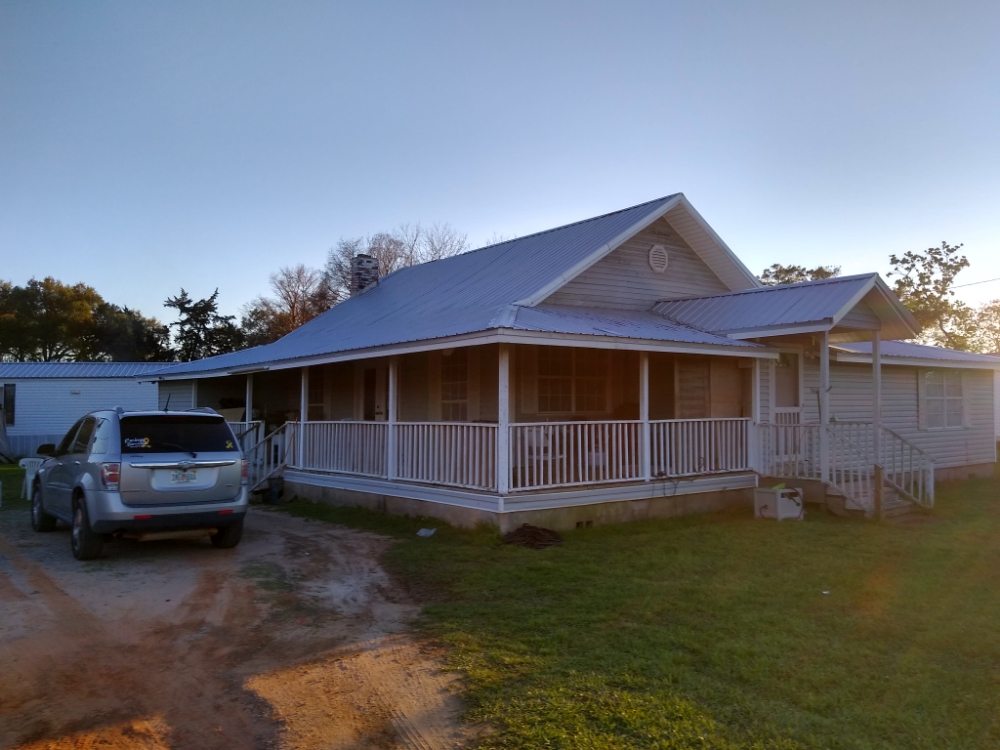 Slide of Leonard Roofing