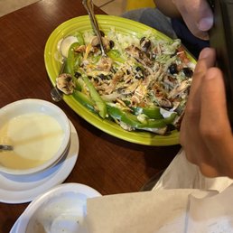 The salad person three ordered with peppers and mushrooms but weren't mentioned on the description. The salad person three ordered with peppers and mushrooms but weren't mentioned on the description.