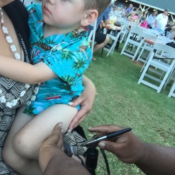 Chief's Luau - Getting Temp Tattoo at Chiefs luau - Performing Arts Near Me - Kapolei, Hawaii