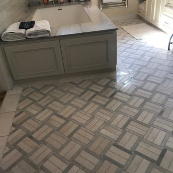 InStyle Tile Boutique - a bathtub in a bathroom - Building Supplies Near Me - Santa Clarita, California