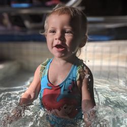 Outdoor Adventures Saginaw Bay Resort - Child at indoor pool