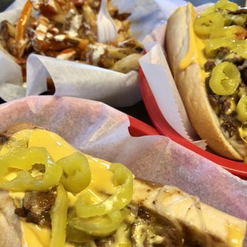Cosmo's - 3-Cheese Cheesesteak with onions and banana peppers & volcano fries (hot sauce and blue cheese). Both were excellent. - Cheesesteaks Near Me - Scranton, Pennsylvania Cosmo's - 3-Cheese Cheesesteak with onions and banana peppers & volcano fries (hot sauce and blue cheese). Both were excellent. - Cheesesteaks Near Me - Scranton, Pennsylvania