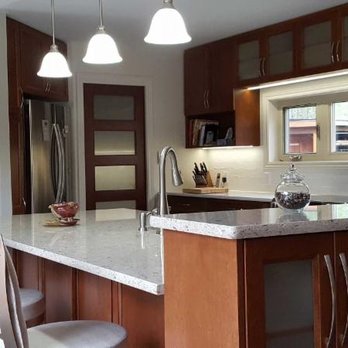 Paramount Kitchens - a kitchen with a center island - General Contractors Near Me - Petawawa, Ontario Paramount Kitchens - a kitchen with a center island - General Contractors Near Me - Petawawa, Ontario