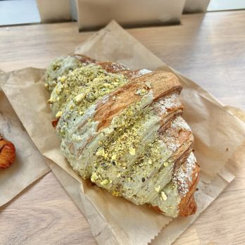 Enchanted Coffee - Pistachio Matcha Croissant - Coffee & Tea Near Me - Santa Ana, California Enchanted Coffee - Pistachio Matcha Croissant - Coffee & Tea Near Me - Santa Ana, California