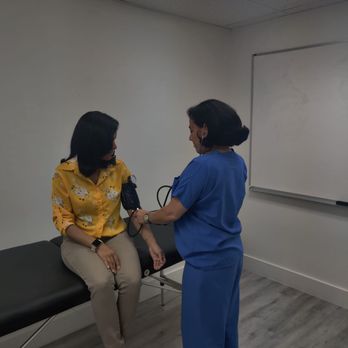 Royal Research Corp - The patient is getting vitals checked before seeing the doctor. - Walk-in Clinics Near Me - Hollywood, Florida Royal Research Corp - The patient is getting vitals checked before seeing the doctor. - Walk-in Clinics Near Me - Hollywood, Florida