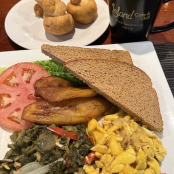 Island Cafe & Grill - Ackee & callaloo with fried dumplings - Breakfast & Brunch Near Me - Hyannis, Massachusetts Island Cafe & Grill - Ackee & callaloo with fried dumplings - Breakfast & Brunch Near Me - Hyannis, Massachusetts