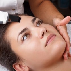 Molly Michael, LE - Ultrasonic spatula exfoliates the skin by using ultrasonic waves, to loosen and draw out excess dead skin cells and debris.