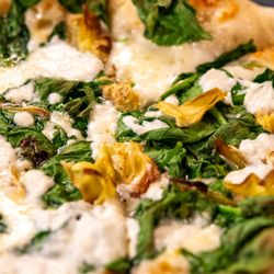 Trailhead Bar | Grill | Wood Fired Pizza - Spinach Artichoke and Ricotta
Roasted garlic and onion oil, fresh mozzarella, provolone, spinach, artichoke heart, ricotta, EVOO